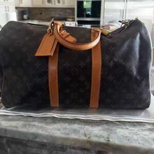 Louis Vuitton duffel bag EUC